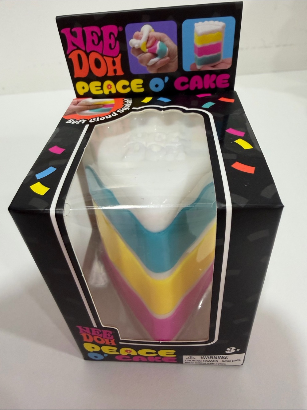 Nee Doh Peace O' Cake Kids Toy - White, Blue, Yellow, Pink